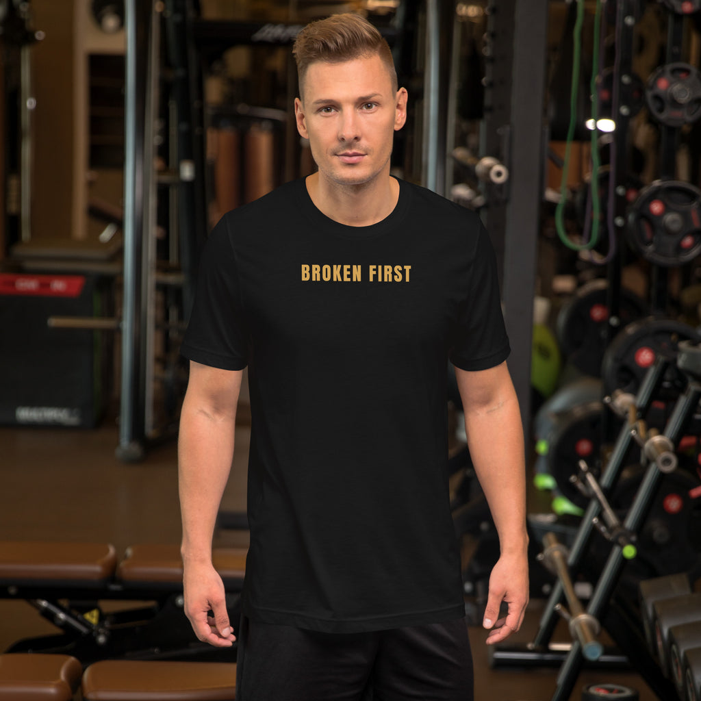 Built Different T-shirt, Black, front: gold BROKEN FIRST across the chest