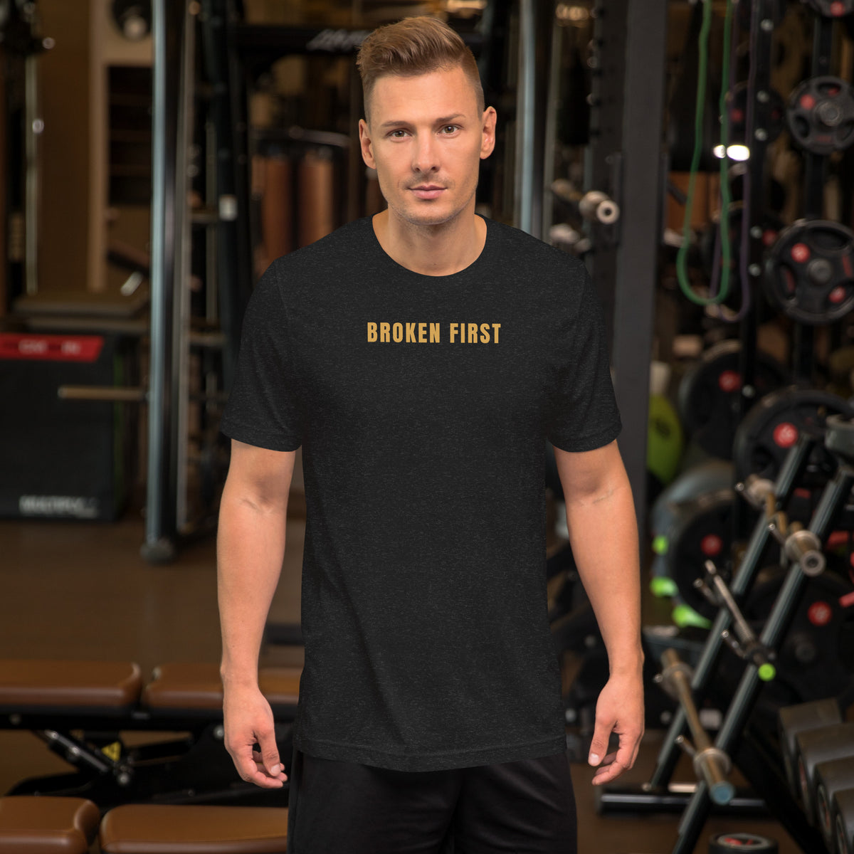 Built Different T-shirt, Black Heather, front: gold BROKEN FIRST across the chest