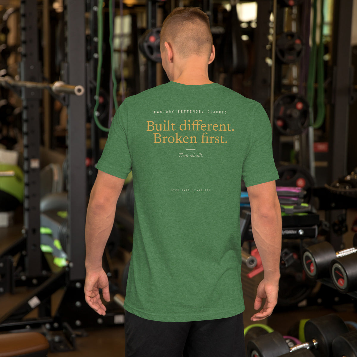 Built Different T-shirt, Heather Grass Green, back: Built different. Broken first. Then rebuilt.