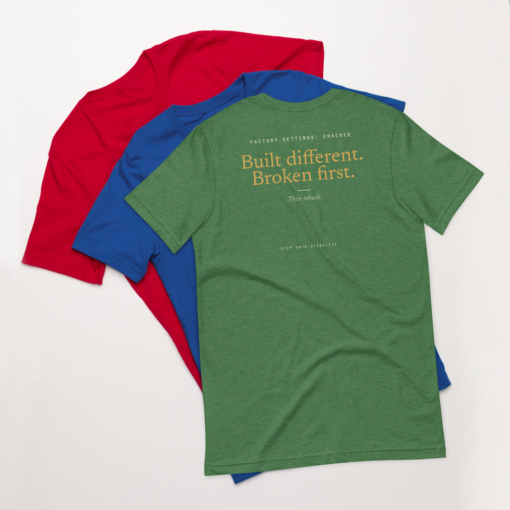Built Different T-shirt, Heather Grass Green, back: Built different. Broken first. Then rebuilt.