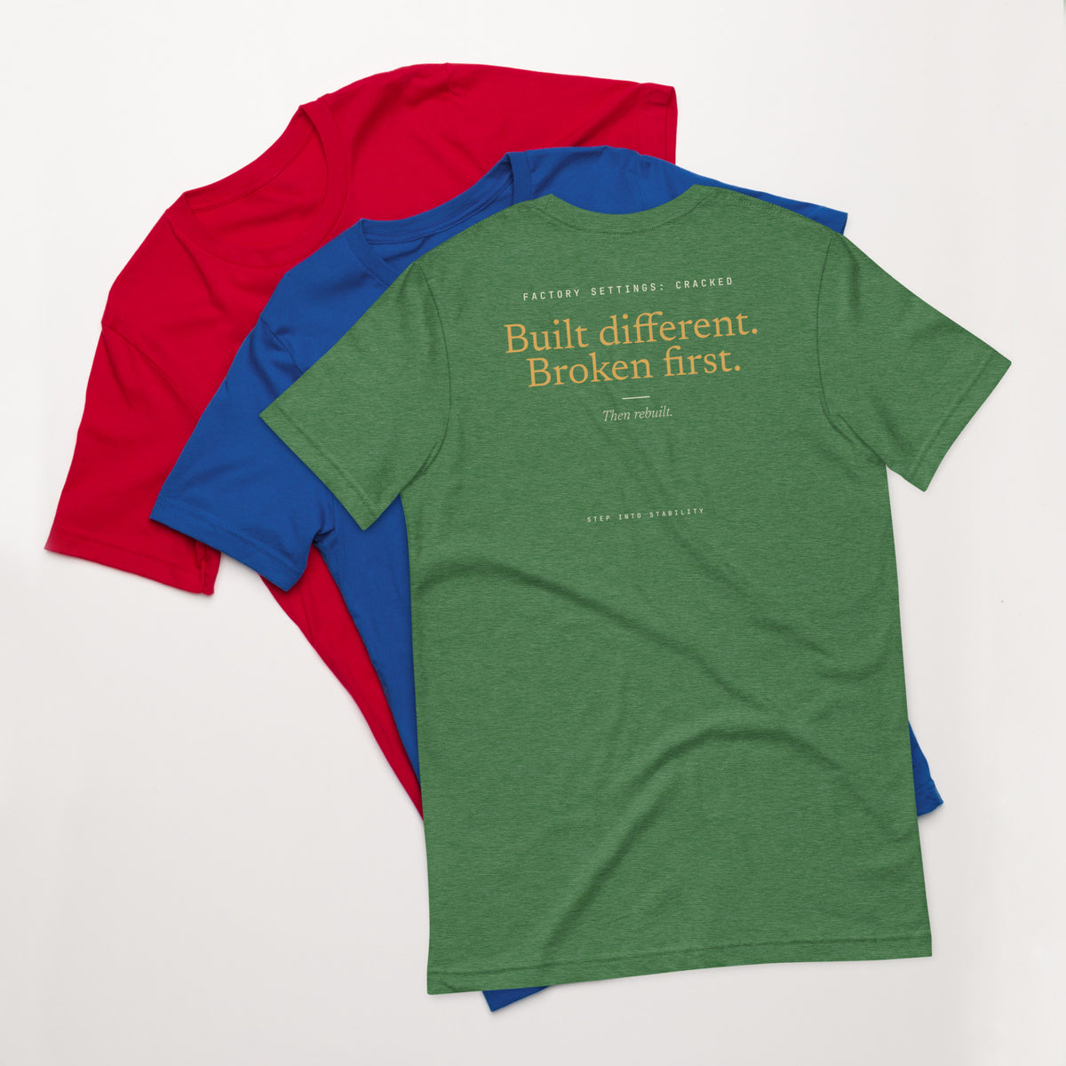 Built Different T-shirt, Heather Grass Green, back: Built different. Broken first. Then rebuilt.