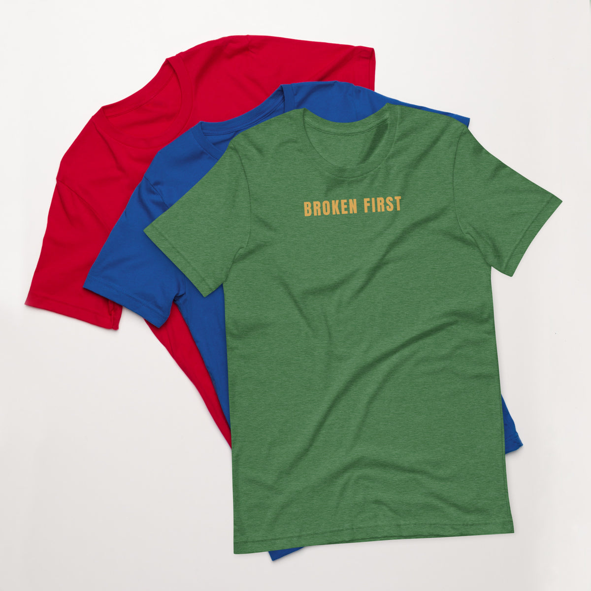 Built Different T-shirt, Heather Grass Green, front: gold BROKEN FIRST across the chest