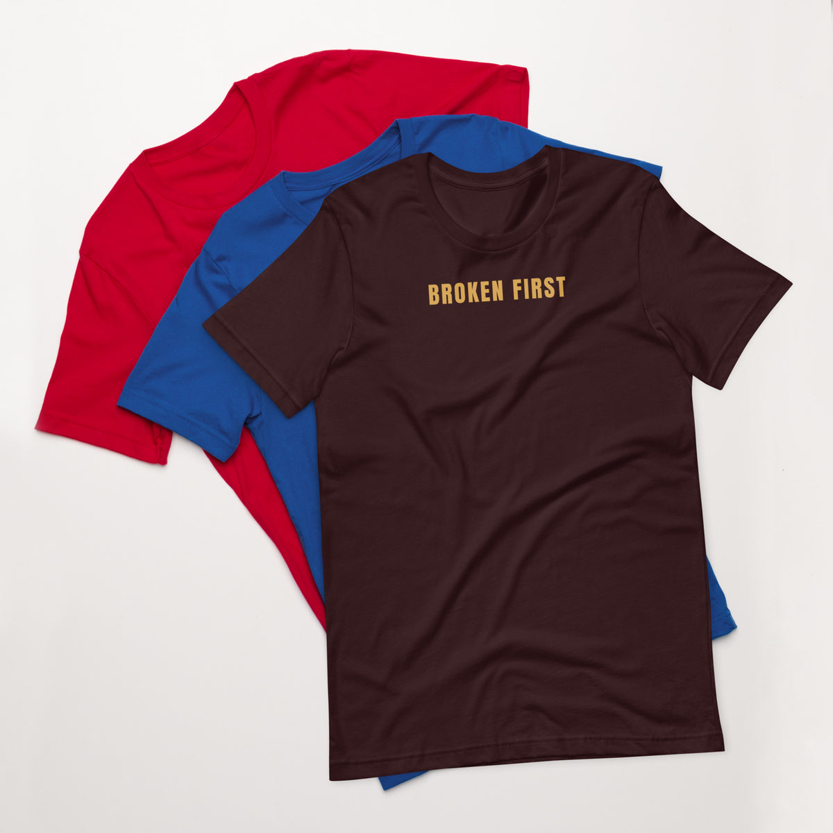 Built Different T-shirt, Oxblood Black, front: gold BROKEN FIRST across the chest